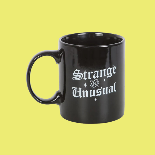 STRANGE AND UNUSUAL MUG