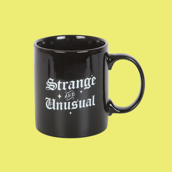 STRANGE AND UNUSUAL MUG