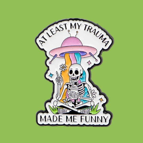 TRAUMA MADE ME FUNNY SKELETON PIN