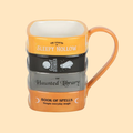 THE HAUNTED LIBRARY BOOK STACK MUG