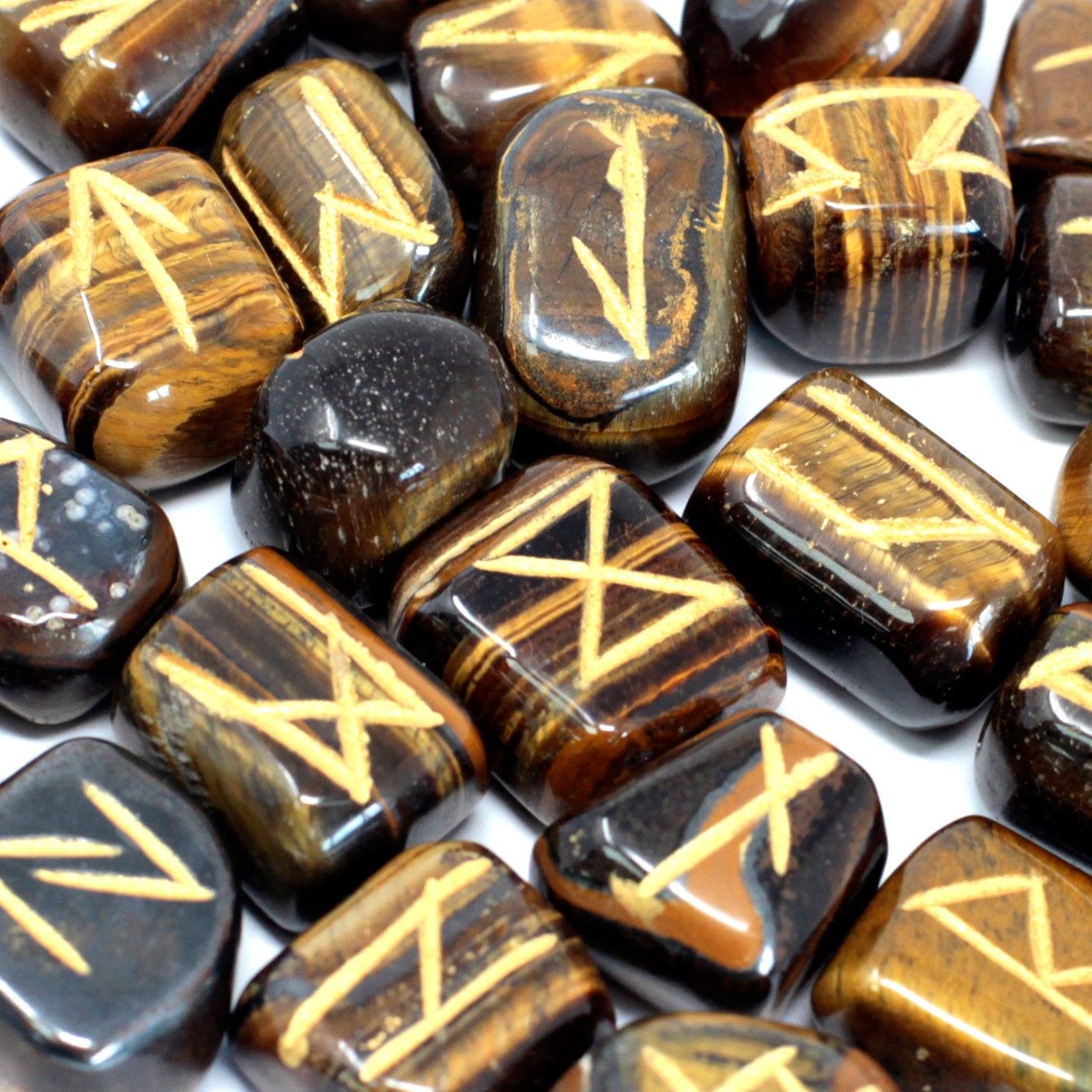 TIGER EYE RUNE STONE SET IN POUCH